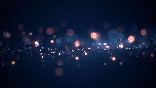 Midnight sparkle bokeh band with soft star glints and cosmic blue-peach glow, dreamy