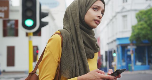 Young Woman in Urban Setting Using Smartphone at Crosswalk - Download Free Stock Images Pikwizard.com