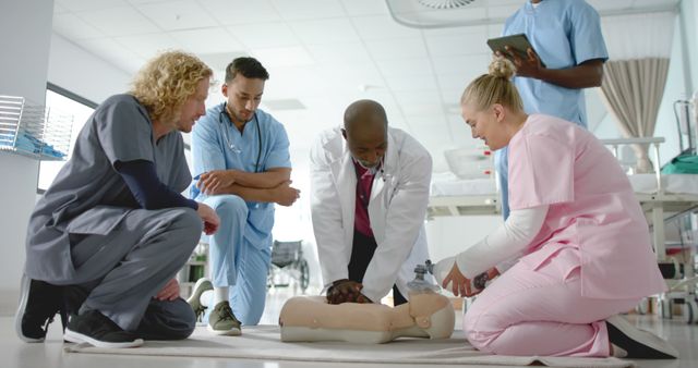 Medical Team Demonstrating CPR Technique on Training Manikin - Download Free Stock Images Pikwizard.com