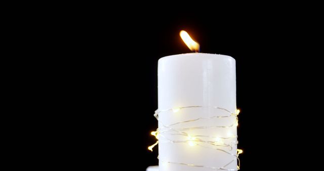 Lit White Candle with Fairy Lights on Dark Background - Download Free Stock Images Pikwizard.com