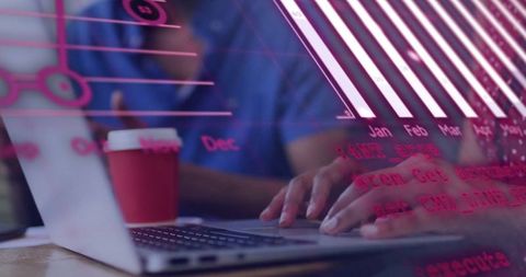 Software developer typing on laptop with digital data and coffee