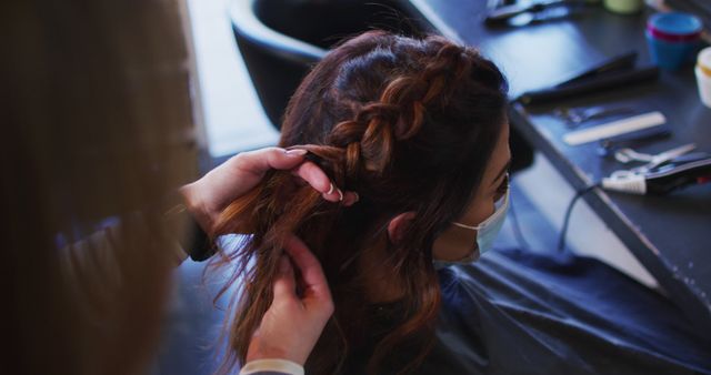 Hairdresser Braiding Client's Hair in Salon with Protective Mask - Download Free Stock Images Pikwizard.com