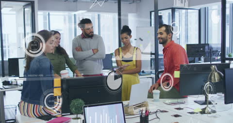 Diverse Team Collaborating in Modern Office with Digital Financial Analytics