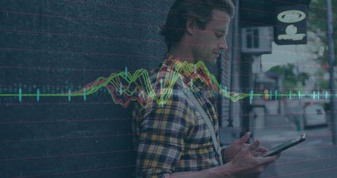 Businessman analyzing financial data on tablet outdoors