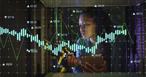 Engineer Analyzing Data with Digital Overlay in Server Room - Download Free Stock Images Pikwizard.com