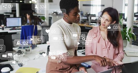 Diverse Professionals Engaging in Dynamic Social Media Conference