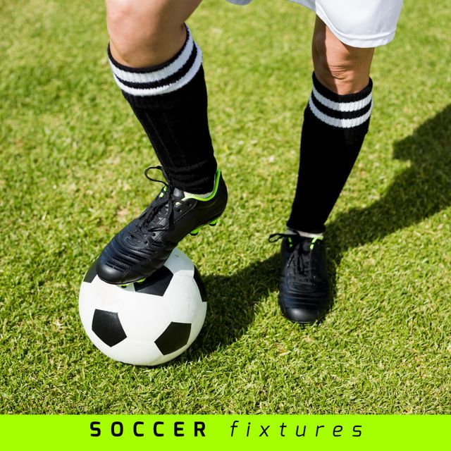 Composition of soccer fixtures text with legs of caucasian football player with football on pitch. Football, sports and competition concept.