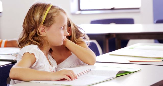 Focused young students attentive in classroom during lesson - Download Free Stock Images Pikwizard.com