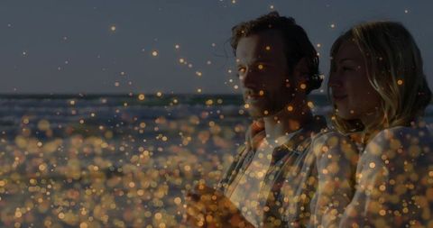 Quiet beachside romance at sunset with bokeh magic