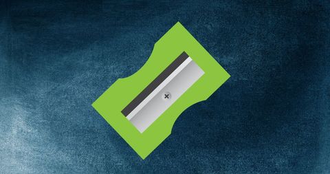 Colorful pencil sharpener icon on dark background