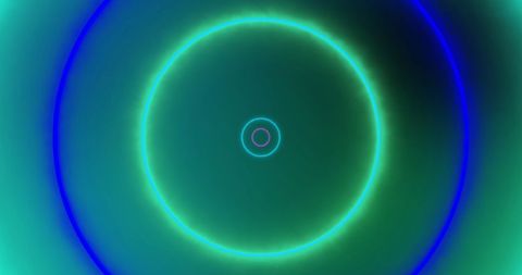 Colorful Pulsating Neon Circles on Green Background