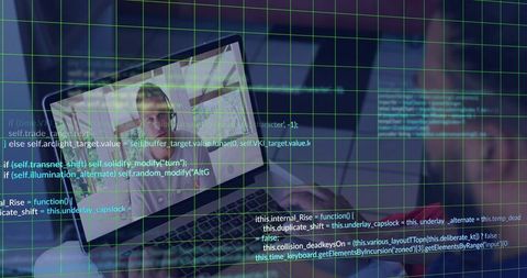 Developer working on laptop during virtual meeting with code grid overlay