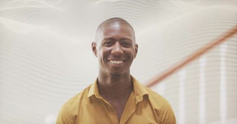 Smiling Professional Man in Modern Office Environment
