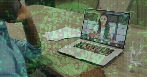 Remote Collaboration Video Call on Laptop with Data Visualization Overlay for Hybrid Teams
