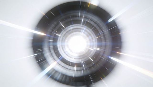 Emitting circular lens producing starburst flares with concentric rings and prismatic streaks