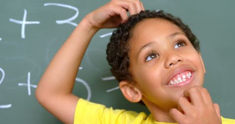 Imaginative Schoolboy Pondering Math Solutions - Download Free Stock Images Pikwizard.com