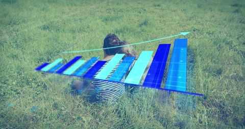 Couple Analyzing Rising Data Chart Outdoors for Growth Concepts