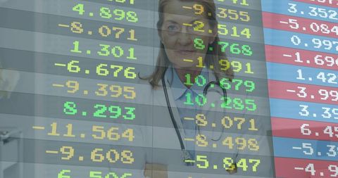 Senior Female Doctor Overlaid with Financial Ticker Representing Healthcare Data Analytics