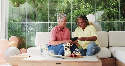 Senior Lesbian Couple Celebrating Birthday at Home