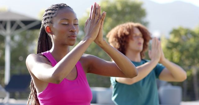 Women Practicing Yoga Outdoors in Focused Meditative State - Download Free Stock Images Pikwizard.com