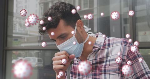 Masked Man Coughing Amid Symbolic Virus Particles