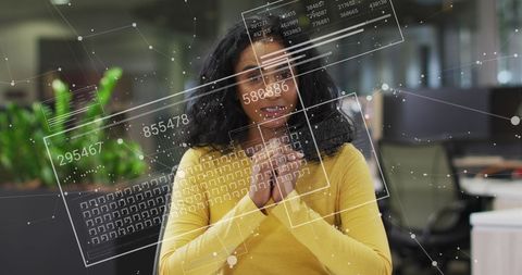 Businesswoman Analyzing Data in Modern Digital Workspace
