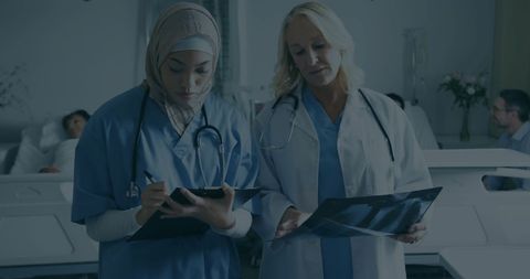 Diverse Female Doctors Collaborating in Hospital Setting