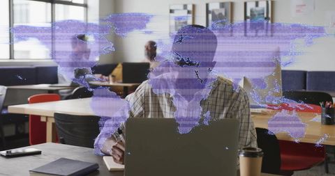 Global teamwork in modern office with digital world map overlay
