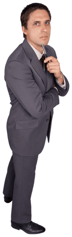 Focused Businessman Posing on Transparent Background in Formal Suit