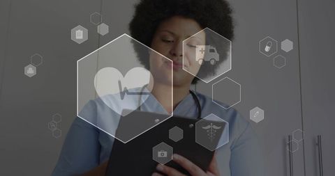 Nurse using tablet with hex healthcare icons overlay for telemedicine and clinical records