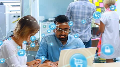 Tech Professionals in Modern Office Discussing Digital Connectivity