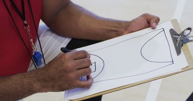 Coach Drawing Basketball Play on Clipboard During Practice - Download Free Stock Images Pikwizard.com