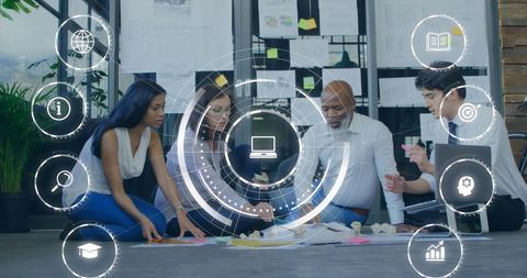 Diverse Colleagues Collaborating with Digital Interface Circles Overlay