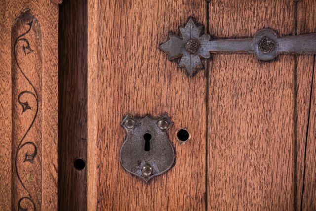 Intricate Keyhole on Antique Wooden Door with Decorative Metalwork - Download Free Stock Photos Pikwizard.com