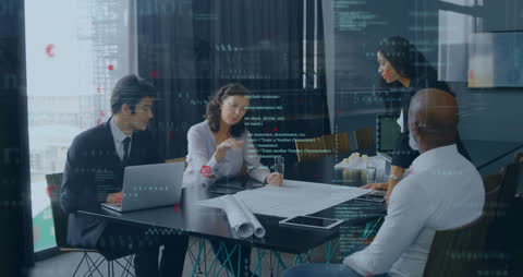 Business Team Analyzing Data in Modern Office with Digital Interfaces