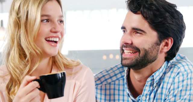 Cheerful Couple Enjoying Coffee Together in Cafe - Download Free Stock Images Pikwizard.com