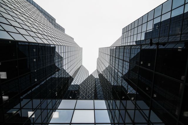 Modern Glass Skyscrapers Reflecting Sky in Urban Area - Download Free Stock Photos Pikwizard.com
