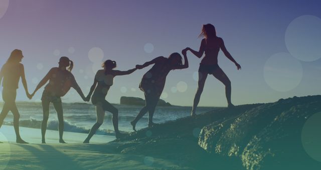 Group of friends hiking on beach at sunset - Download Free Stock Images Pikwizard.com