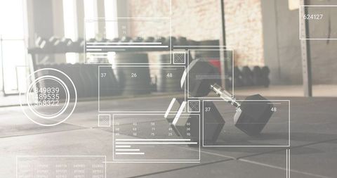 Hex dumbbells on rubber floor with fitness hud overlays in industrial gym loft