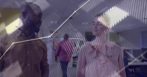 Diverse Professionals Analyzing Financial Growth in Modern Office