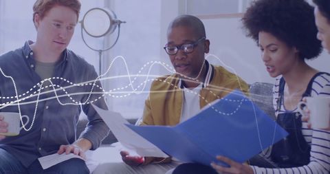 Collaborative Business Meeting Discussing Financial Data