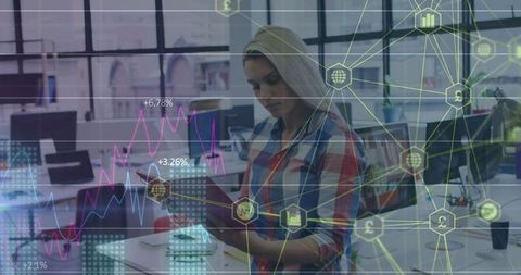 Businesswoman Analyzing Digital Interface in Modern Office Environment