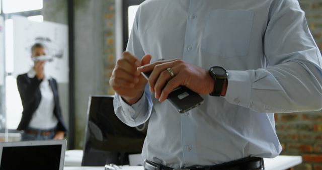 Businessman Using Modern Technology in Startup Office - Download Free Stock Images Pikwizard.com