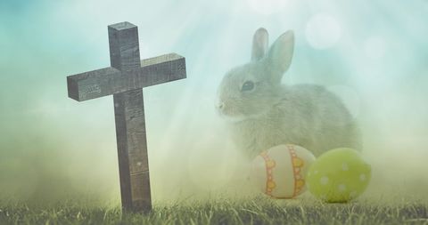 Symbolic Easter Scene with Cross, Bunny, and Egg Decorations - Download Free Stock Images Pikwizard.com