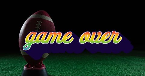 American Football on Holder with Game Over Sign - Download Free Stock Images Pikwizard.com