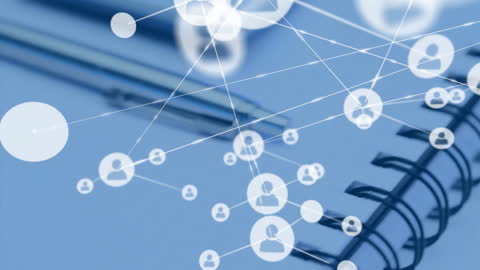 Network Icons Interface with Office Supplies on Desk