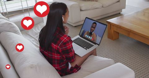 Woman Video Calling on Laptop with Social Media Engagement Icons