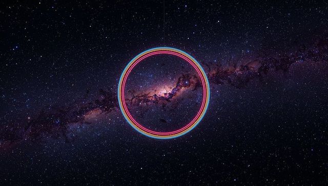 Multicolored Neon Rings Hovering Over Starry Milky Way Galaxy