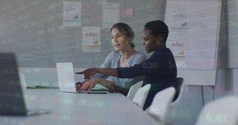 diverse coworkers analyzing financial data on laptop together - Download Free Stock Images Pikwizard.com