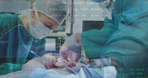 Surgeons Performing Surgery with Overlay of Stock Market Data - Download Free Stock Images Pikwizard.com